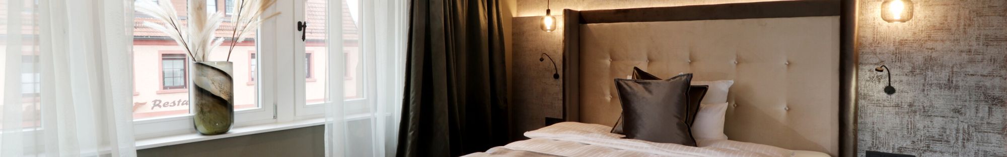 Ein Blick in eines der eleganten Zimmer des Reinhardts Hotel